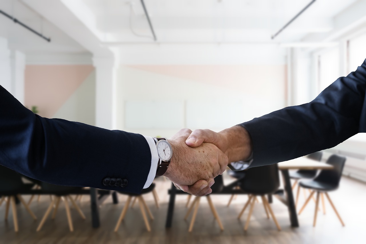 recruiter handshake interview office